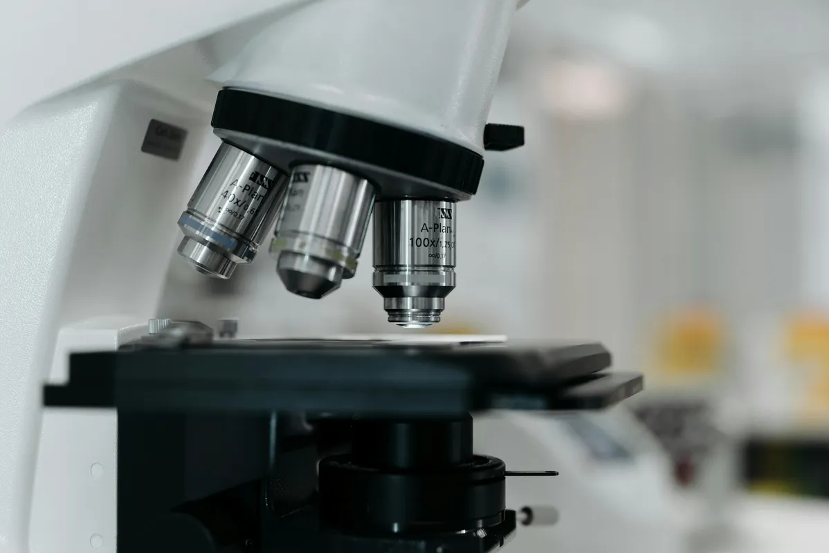 Close-up of a microscope scanning a hematopathological slide.